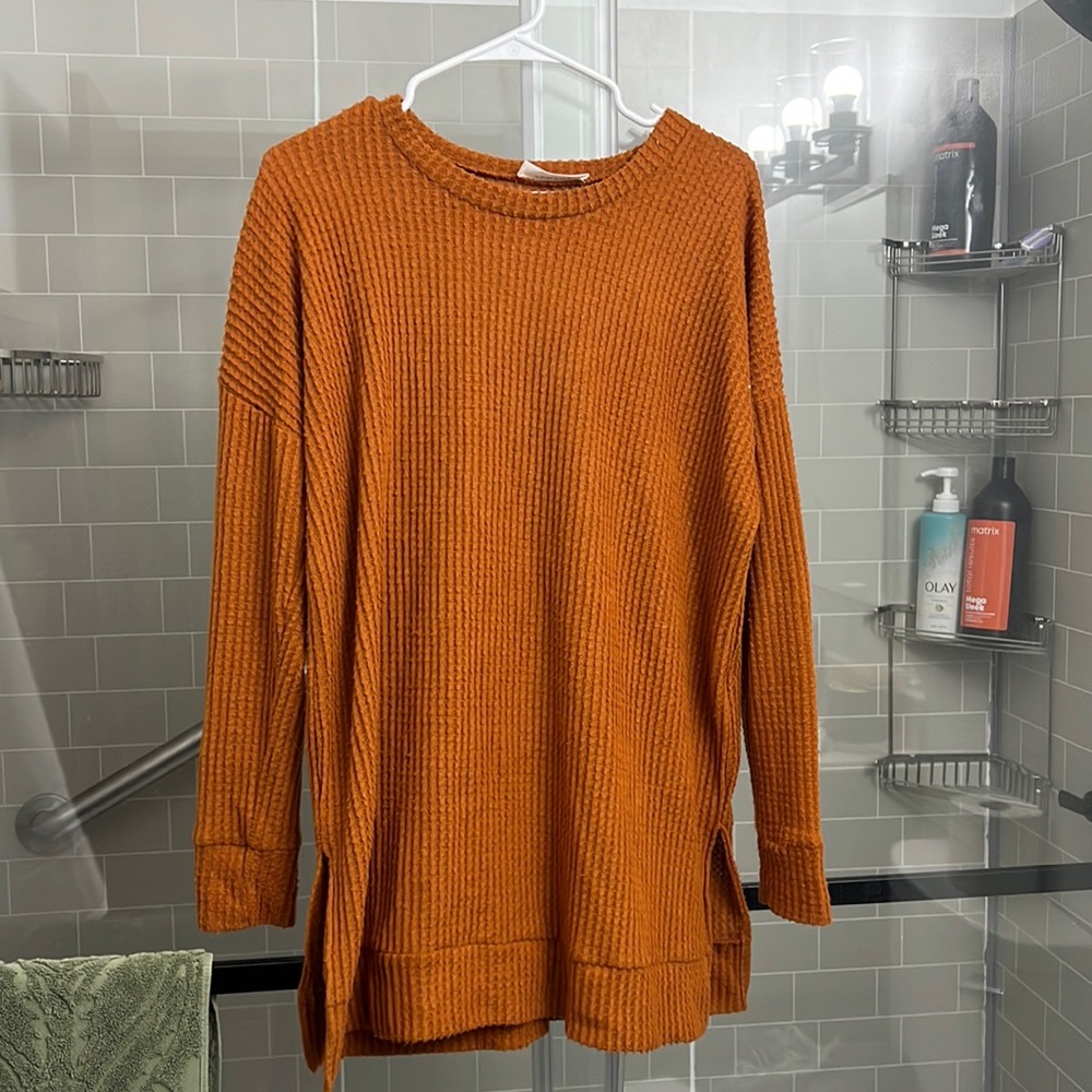 very soft plush sweater, size medium, not too thick and flattering